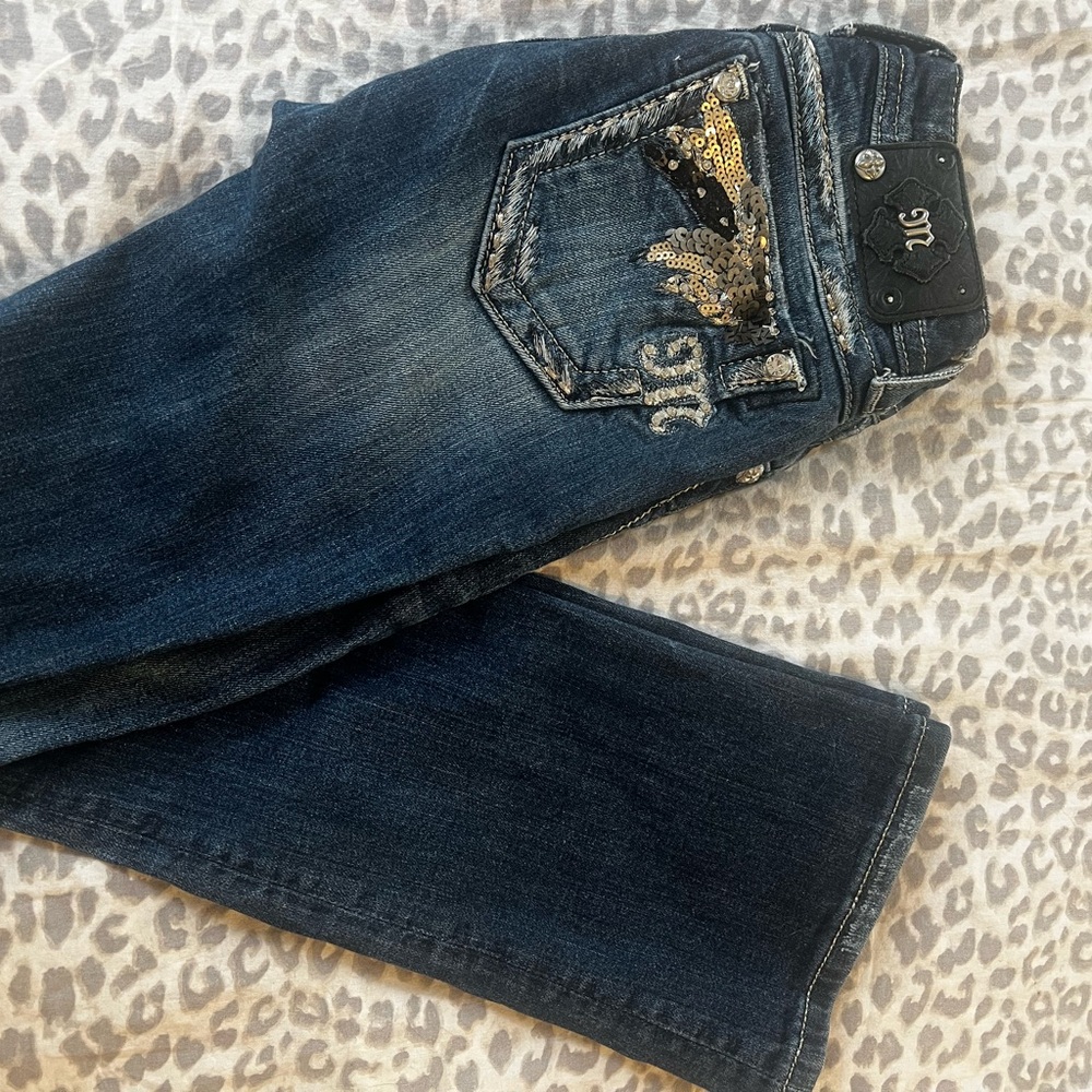 Stylish Blue Jeans with Gold Accents